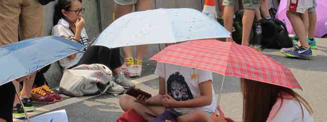 Sun rises: Beijing aims to wait out protesters